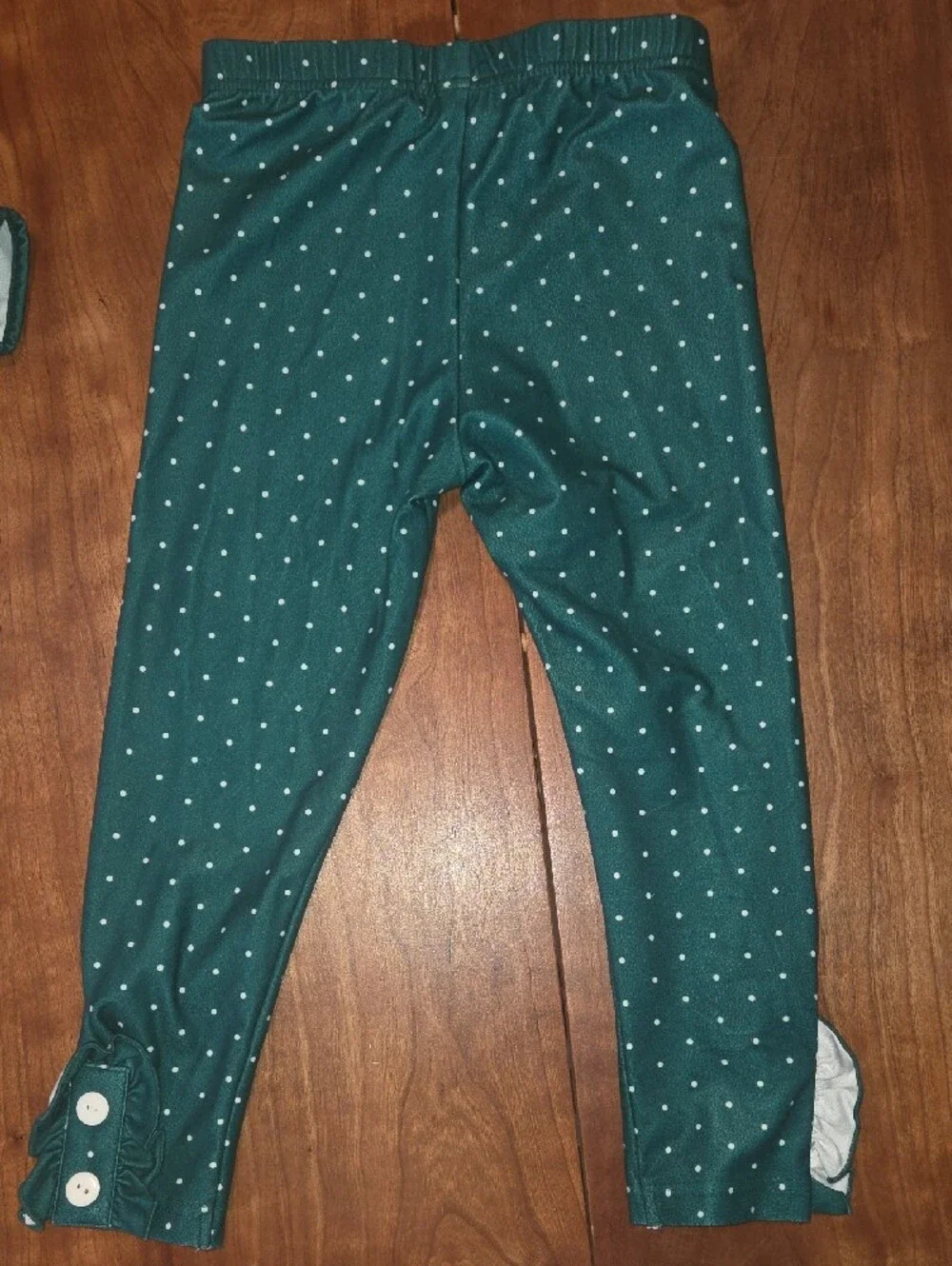 Girls Green Santa Print Pajama Set with Ruffle Top and Polka Dot Leggings